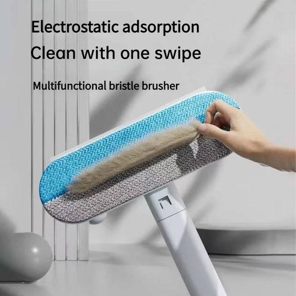 A hand is using a blue and gray electrostatic adsorption multifunctional bristle brush for pet hair removal.