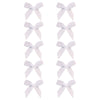 Un set de seis lindos clips para el cabello con lazos de cinta blancos.
