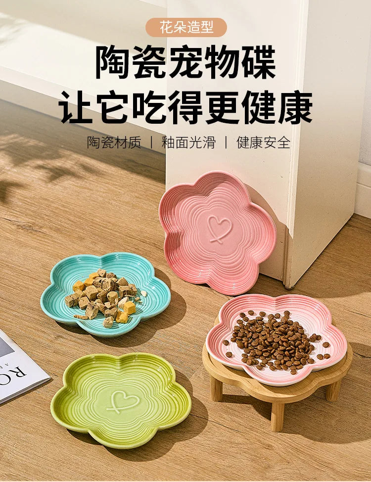 Bol de nourriture pour animaux en céramique rose et vert avec support en bois