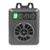 A gray electronic device with a green light and a circular grille for an ultrasonic anti-barking dog repellent.