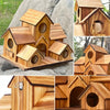 Handmade wooden bird house structure made of natural wood planks and shingles