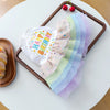 Elegant birthday suit for dogs featuring white tulle with colorful pastel stripes and stars