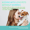 A woman is kissing a dog while using mint dental care powder for pets.