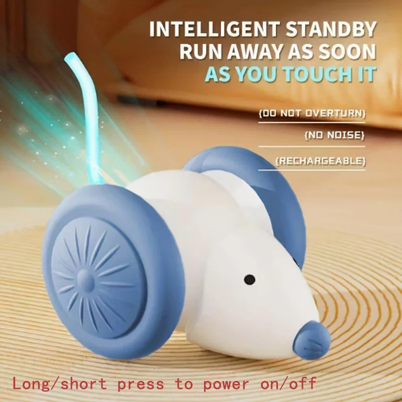 A white electric cat ball toy with blue accents is shown on a wooden surface.