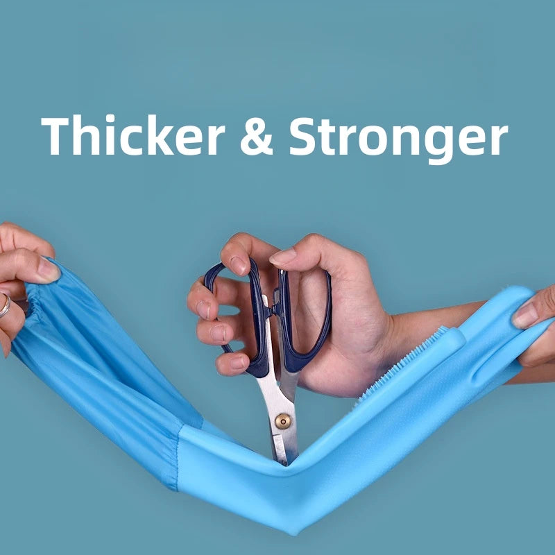 Hands are using grooming scissors to trim a blue pet grooming glove for dogs and cats.