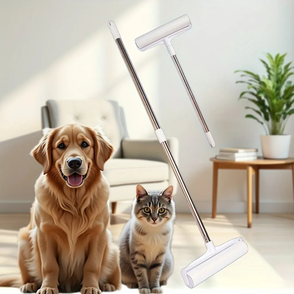 A golden retriever and a tabby cat sit next to a silver retractable lint roller mop with a white handle and clear cleaning pa