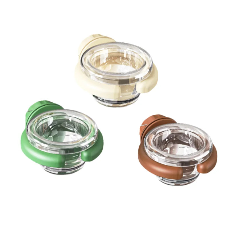 A transparent hanging bird feeder box with a detachable design shown in white, green, and brown colors.