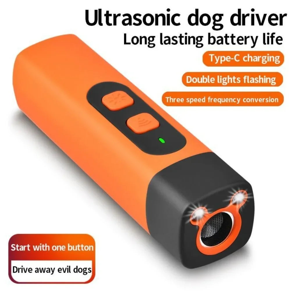 Orange ultrasonic dog driver with a black body and a light-emitting nozzle for deterring bad dogs.