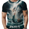 A man wearing a dark t-shirt with a graphic print depicting Jesus and his Savior reaching out to him above crashing waves.