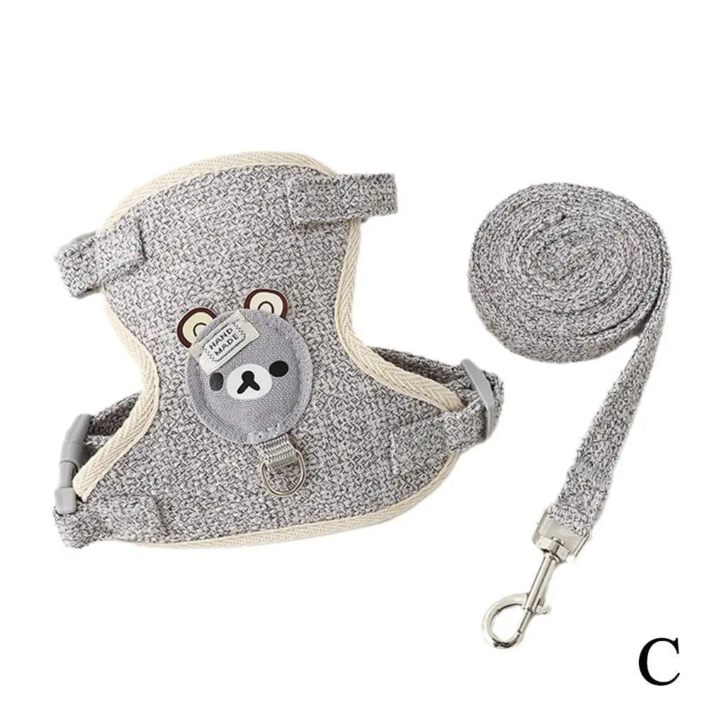 Gray pet leash harness for dogs and cats with a detachable collar and leash