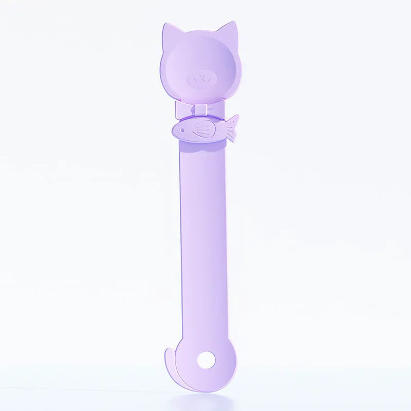 A light purple long-handled pet food dispensing spoon with a cat head design.