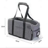 Gray portable pet car seat and booster bed for dogs and cats with black straps