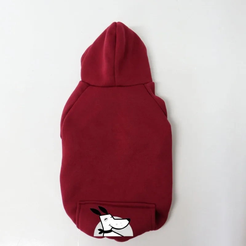 A maroon fleece dog sweatshirt with a hood and pocket featuring a white dog face design.