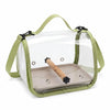 A portable bird travel carrier with a transparent viewing panel and a light green fabric strap.
