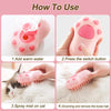 Instructions for using a pink electric pet grooming brush with steam comb to groom a cat.