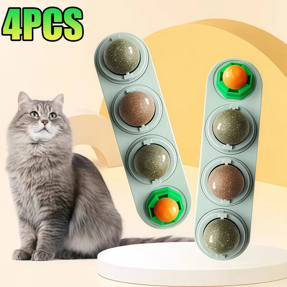 Four green silicone edible catnip licking balls for dental health and play shown next to a cat.