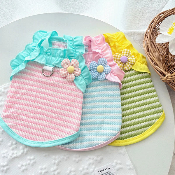 Pink ruffled summer pet vest for dogs with light blue trim and yellow accents