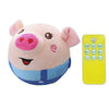 A pink stuffed pig toy with a yellow remote control for interaction.
