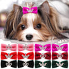 A collection of glitter dog hair clips in various colors and designs for puppies and pets.