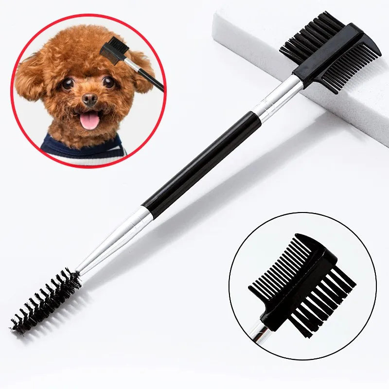 A black pet face comb with a silver handle is shown next to a dog and cat grooming brush.