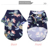 Back and front views of a navy blue Hawaiian leaf print dog shirt for summer