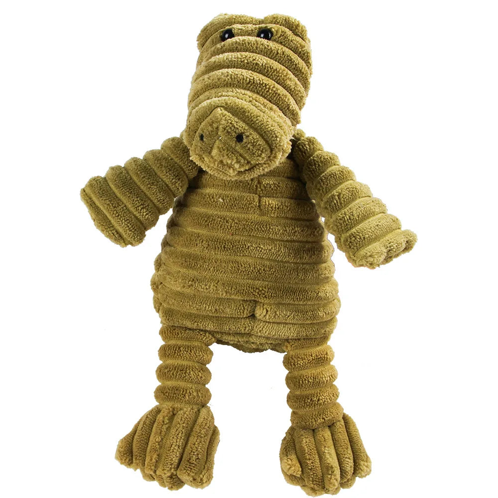 Un juguete de peluche que se asemeja a un molar de perro con pelaje marrón texturizado.