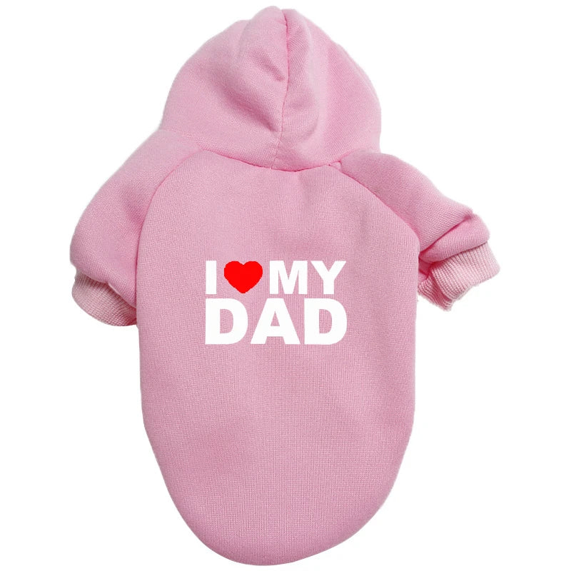 A pink plush coat with the text I love my dad printed on it.