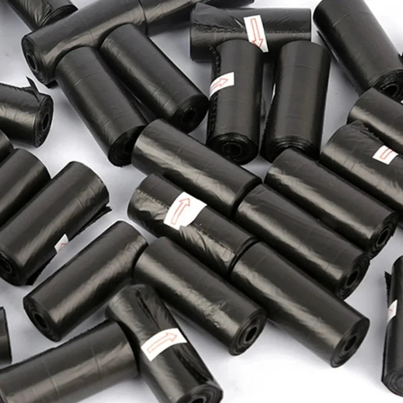 Rolls of black biodegradable dog poop bags with an easy-tear design