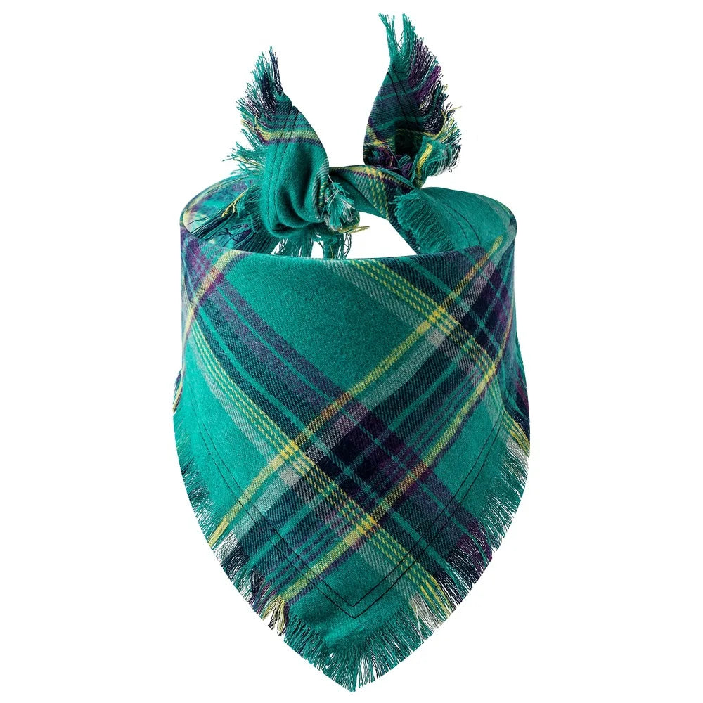 A teal and green plaid dog bandana with fringed edges.