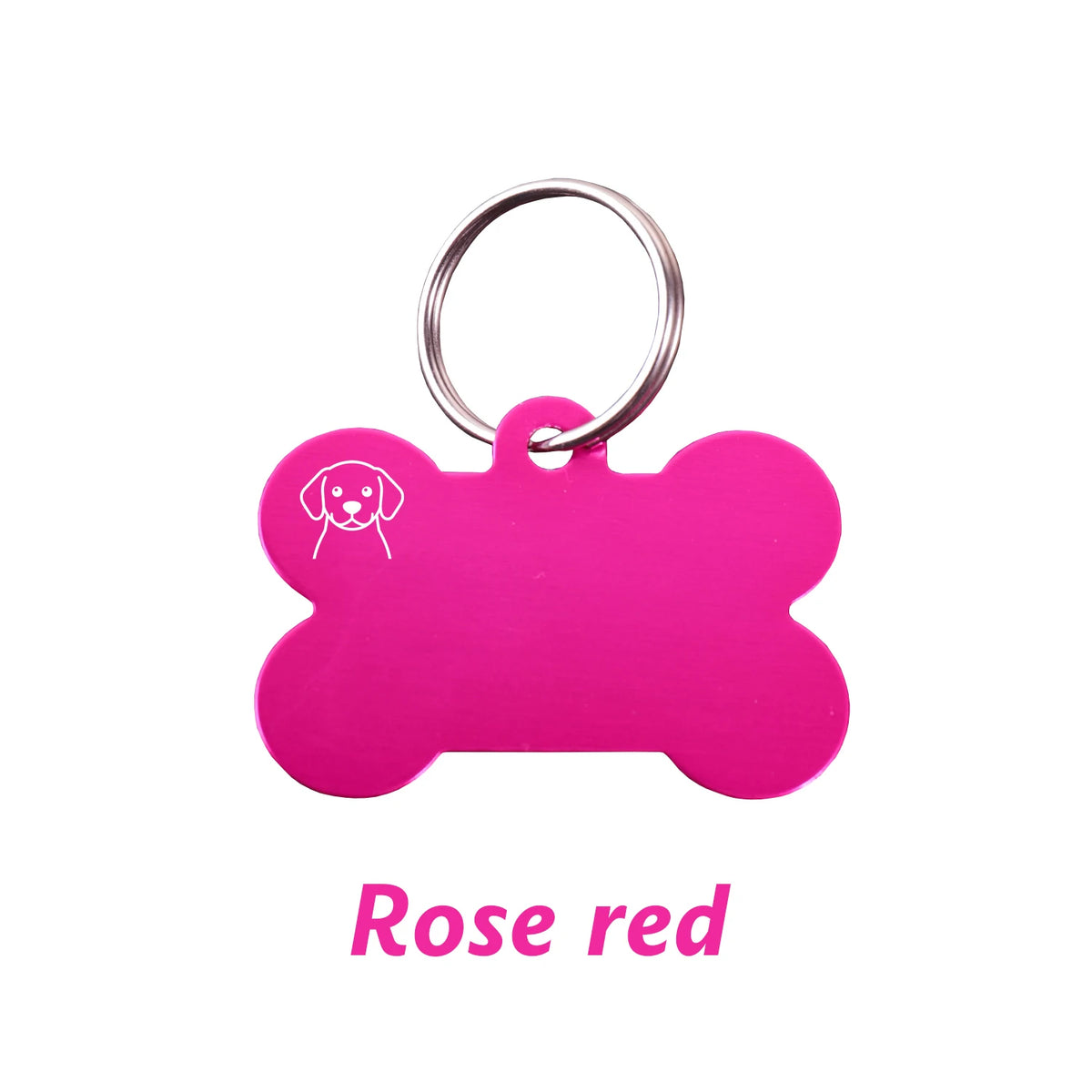 A bright pink bone-shaped dog ID tag with a silver keyring.