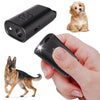 A black portable ultrasonic dog bark deterrent device and a golden retriever puppy.