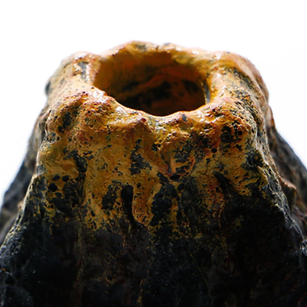 Close-up view of a porous, yellowish-brown bubble stone decoration used for aquarium decor.