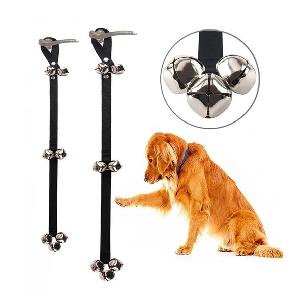 Adjustable pet training doorbell rope with silver bells and black strap shown next to a dog