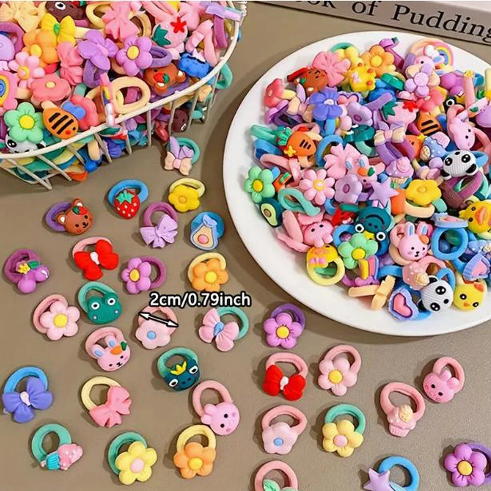 Große Packung bunter Cartoon-Haargummis für Mädchen in verschiedenen Formen und Farben