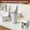 A white 2-in-1 cat litter scoop and sifter is shown next to a bathroom sink.