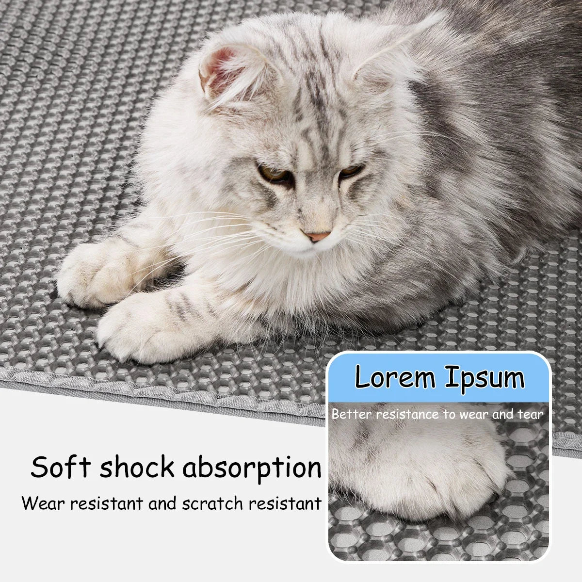 A fluffy gray cat is lying on a gray mat, demonstrating soft shock absorption and wear resistance.