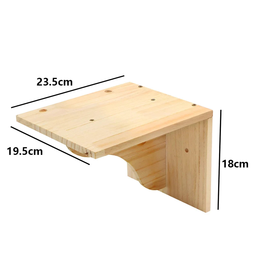 A wooden wall-mounted cat climbing shelf and hammock with dimensions 23.5cm by 19.5cm.