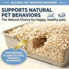 A shallow tray filled with natural wood chip bedding for pets, demonstrating deep bedding for digging and burrowing.