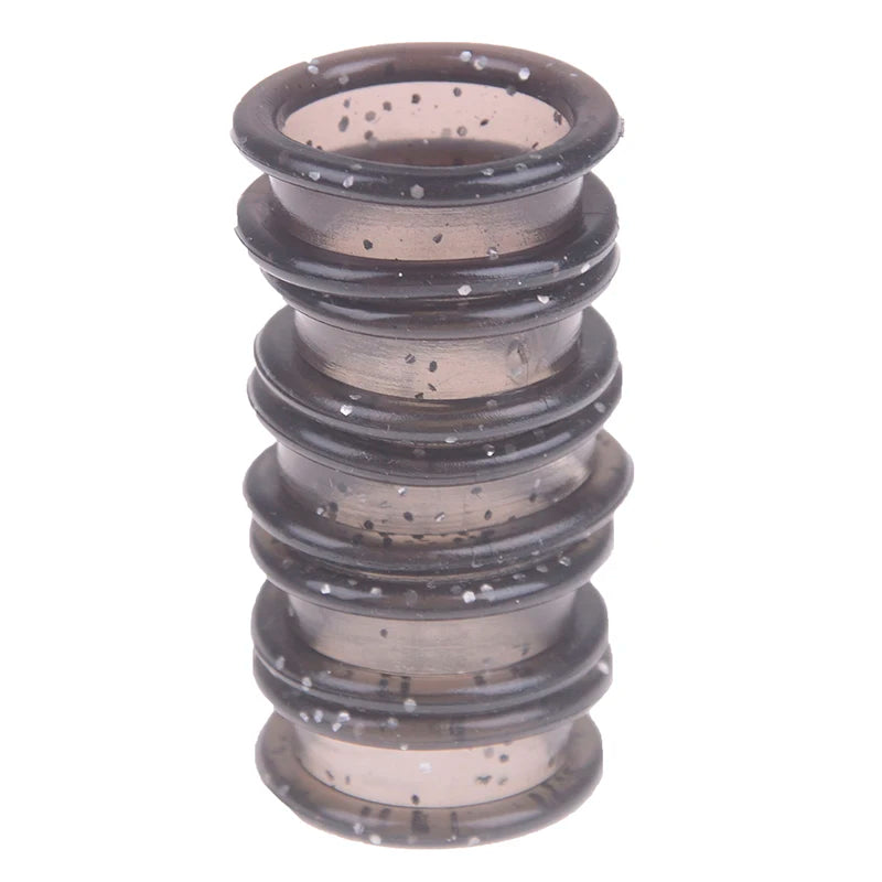 A set of silica gel hair scissors, stacked vertically and showing a dark brown color.