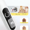 A white electric pet hair trimmer with a digital display showing 99, demonstrating silky, thick, and curly coat trimming.