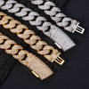 A display of rose gold and silver plated curved flip buckle Cuban link necklaces.