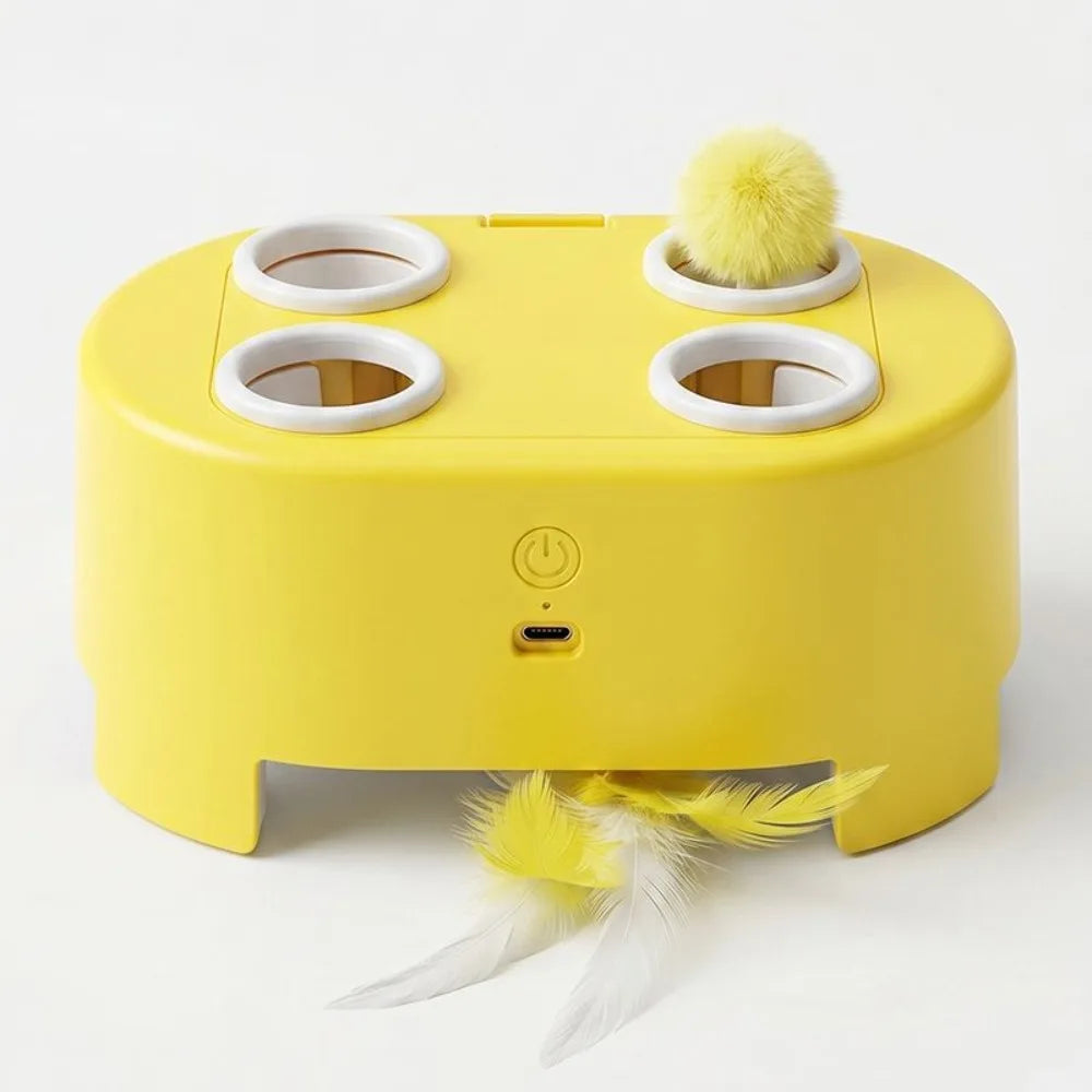 A yellow interactive cat toy featuring a rotating base and fluffy yellow feathers.