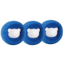 Three blue silicone pet hair removal balls with white bear shapes