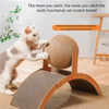 A white cat is interacting with a wooden cat scratch board featuring a sisal-covered ball.