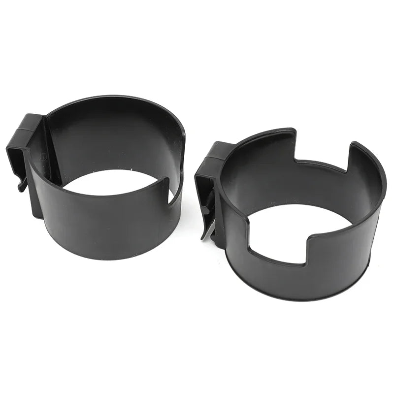 A pair of black portable vehicle drink holders.