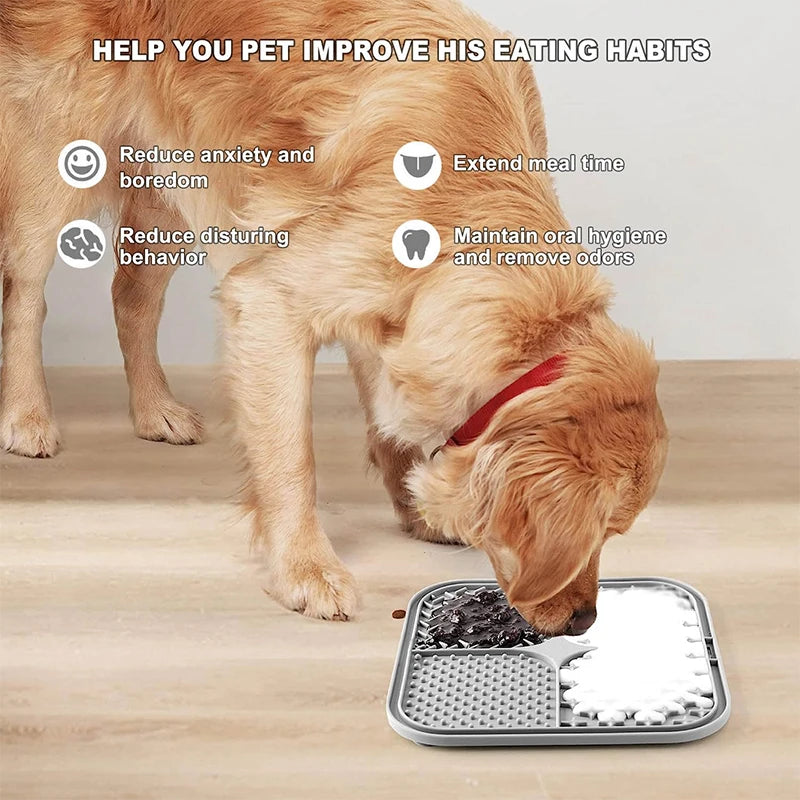 A golden retriever dog is licking food from a silicone lick mat designed to improve eating habits.