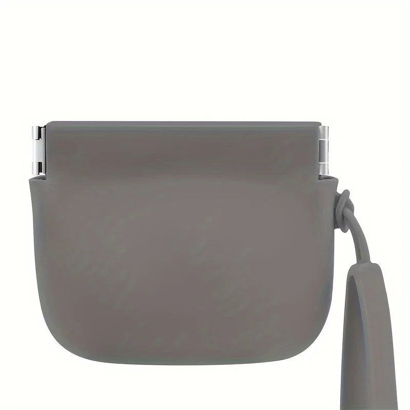 A gray portable silicone dog treat pouch designed for training and walks.