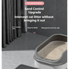 A close-up view of a gray cat control sand pad and litter box with a non-slip mat.