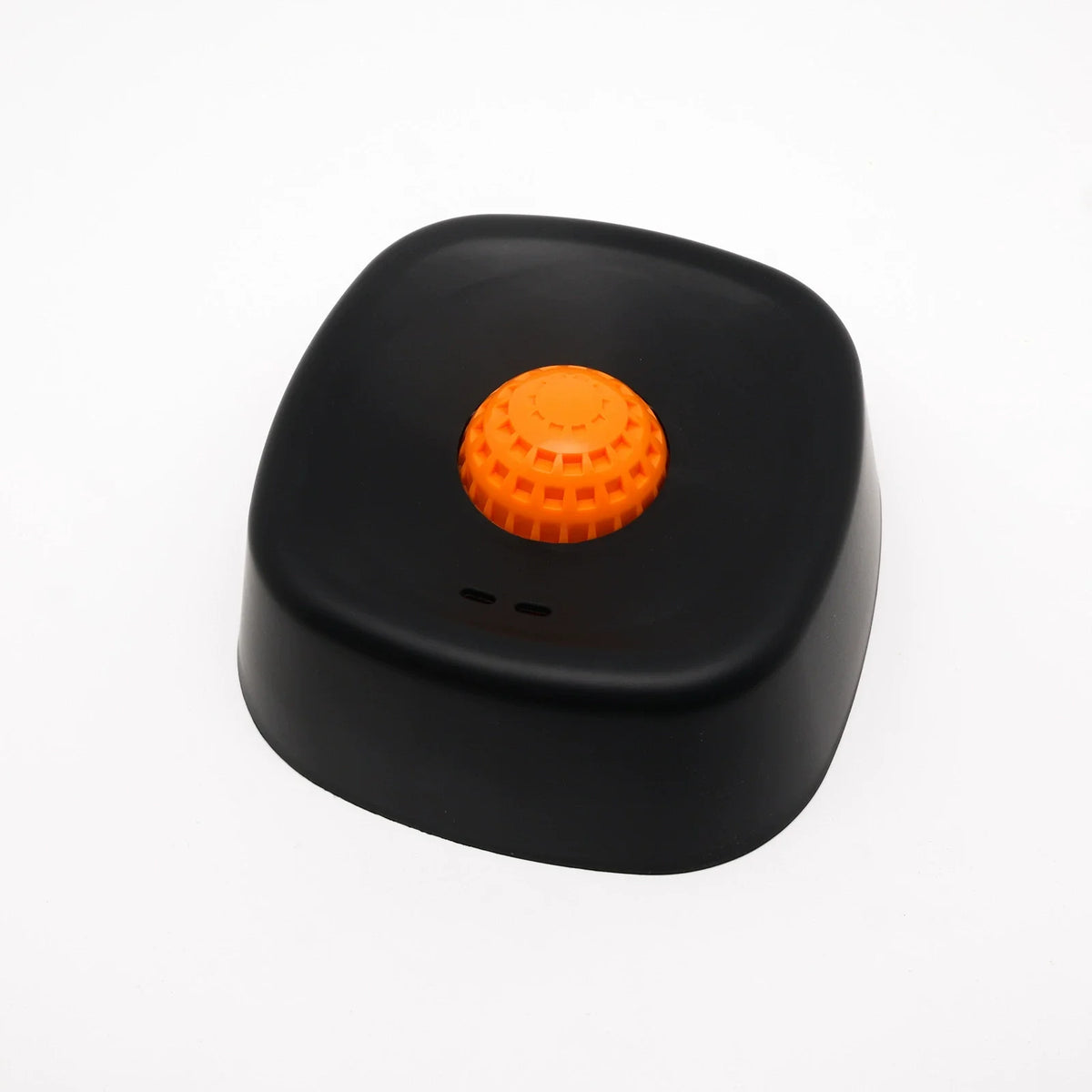 Black silicone lick bowl slow feeder for dogs and cats with an orange textured top