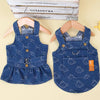 A navy blue denim dog harness dress with a ruffled skirt and a D-ring for small and medium breeds